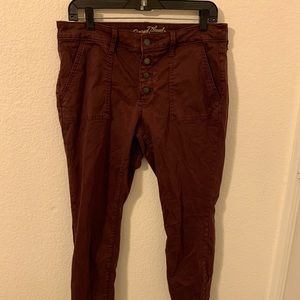 Pale burgundy skinny jeans